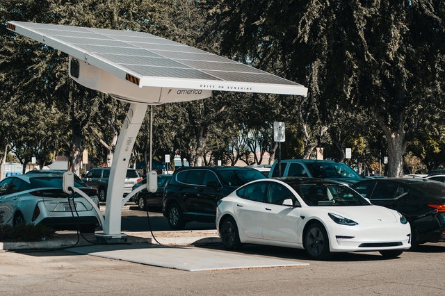 Sustainable Technologies Reshaping Industries - electric car charging on solar technology