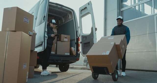 A man and woman working for a delivery company