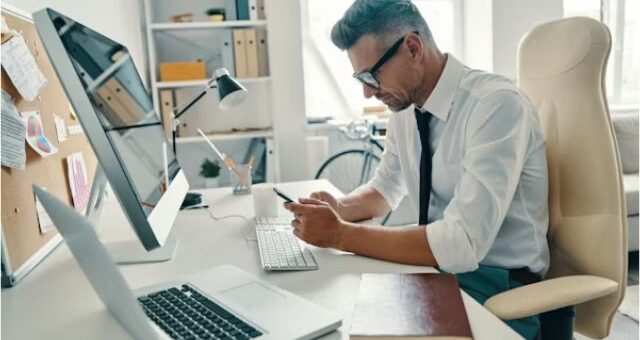 A worker distracted by Phone